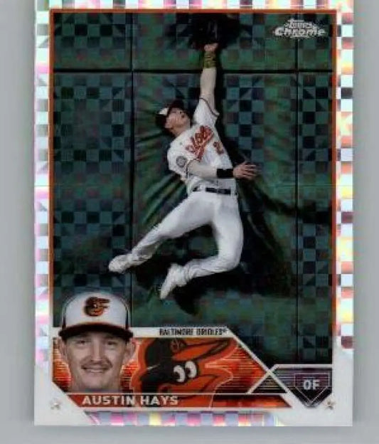 Austin Hays leaps against the wall on this Baltimore Orioles baseball card