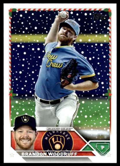 Brandon Woodruff mid-throw in blue jersey on 2023 Topps Holiday Milwaukee Brewers baseball card