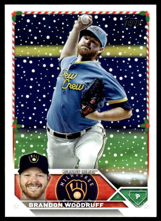 Brandon Woodruff mid-throw in blue jersey on 2023 Topps Holiday Milwaukee Brewers baseball card