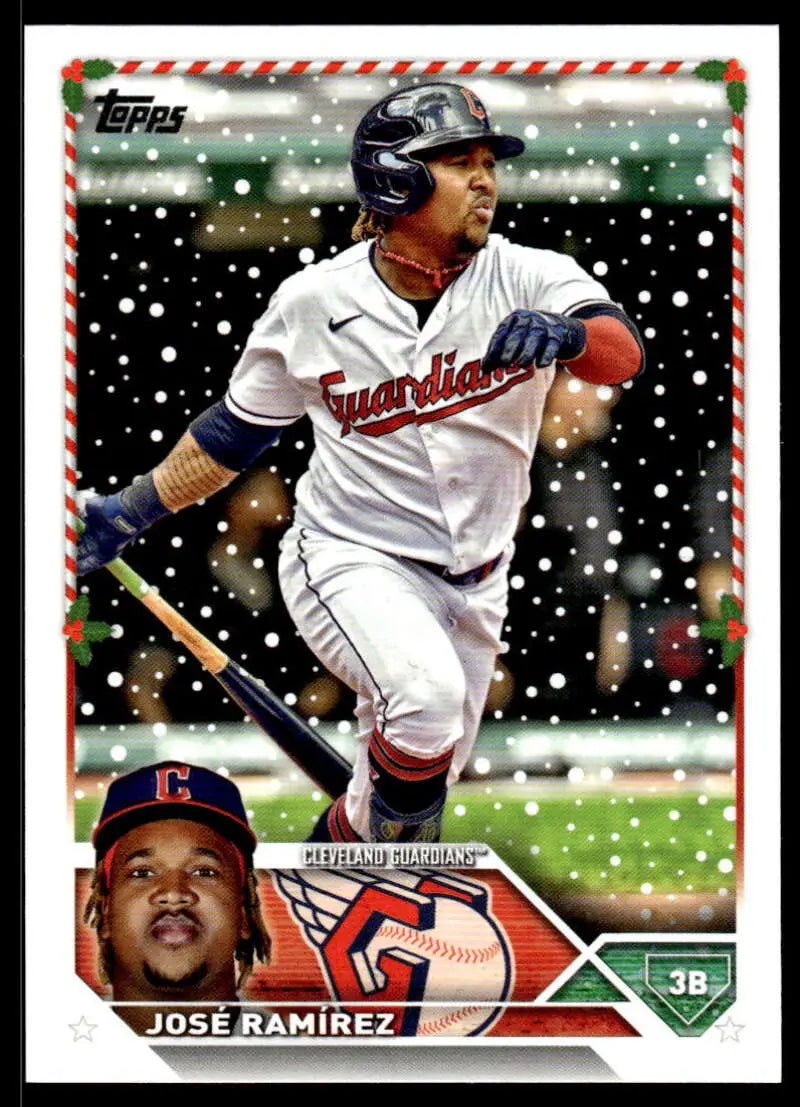 Baseball card of Jose Ramirez in white uniform at bat during snowy Cleveland Guardians game