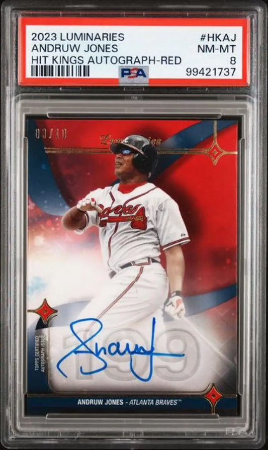 PSA-graded Andruw Jones Atlanta Braves baseball card with autograph on red background