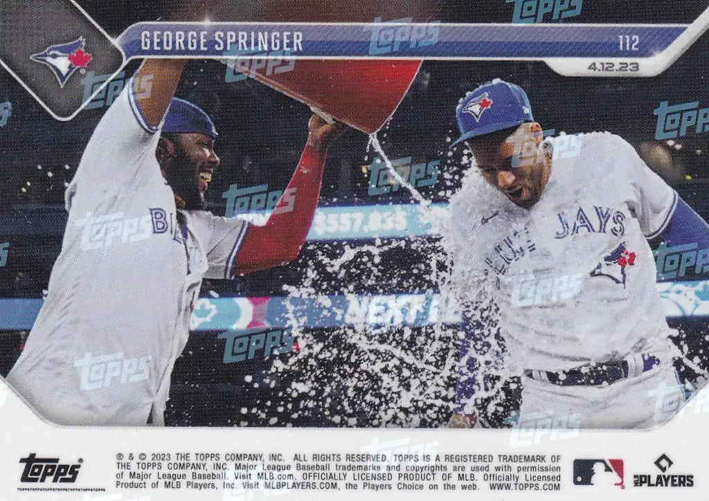 Baseball trading card featuring George Springer drenched by teammate Toronto Blue Jays