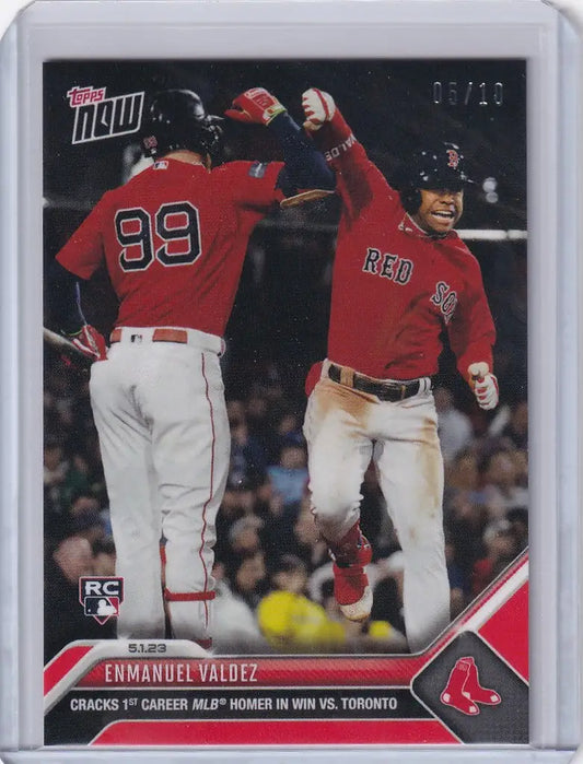 Baseball card of Enmanuel Valdez celebrating with Boston Red Sox teammates
