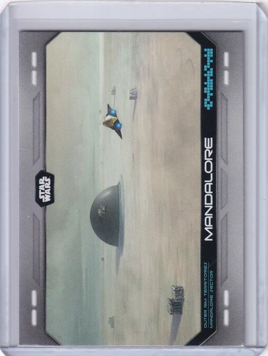 Partially submerged spherical structure on sandy surface from Topps Star Wars flagship series