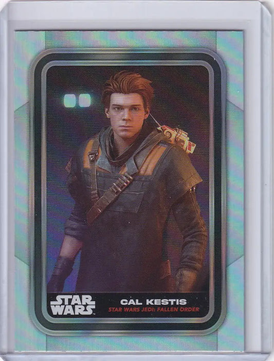 Topps Star Wars Flagship Rainbow Foil card of young Cal Kestis in rugged attire