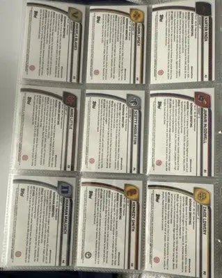 Binder page with nine Bowman Chrome baseball cards featuring player info on the back