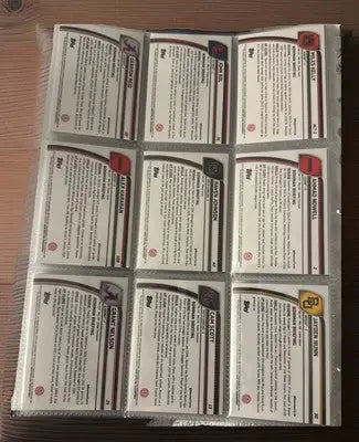 Basketball trading cards on binder page from 2024-25 Bowman Chrome U Black Blue Green Refractor Lot