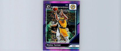 Purple basketball trading card of Myles Turner in a yellow jersey, Myles Turner Hyper Pink