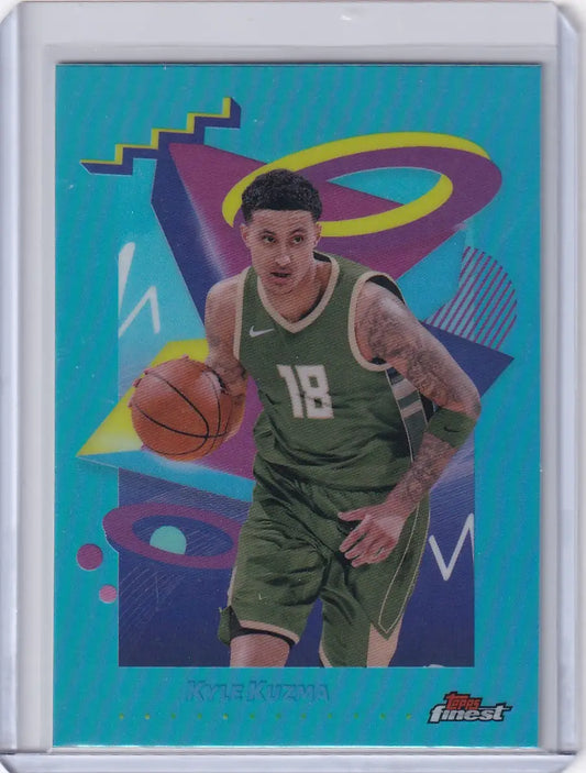 Topps Finest Basketball Sky Blue card of Kyle Kuzma in green jersey dribbling basketball