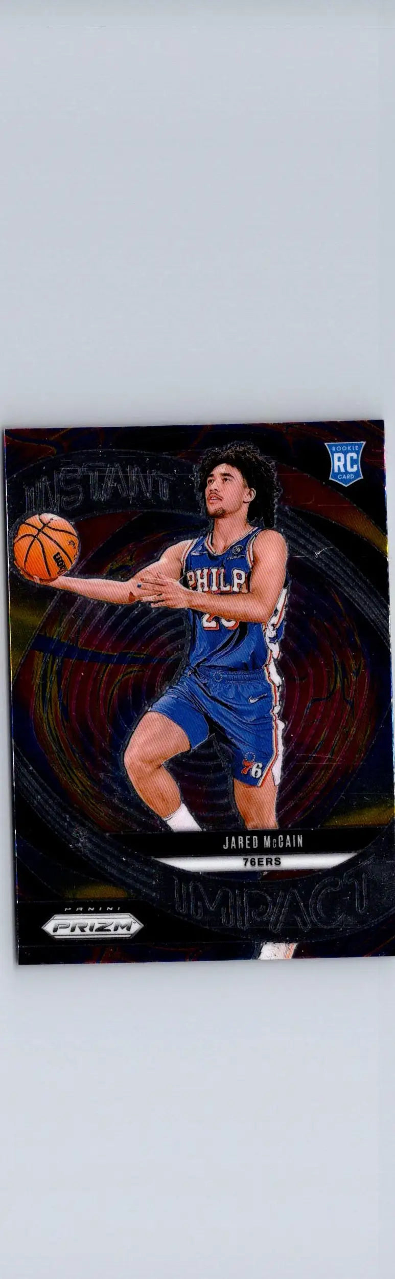 Basketball trading card featuring Jared McCain in blue jersey with basketball, 2024-25 Panini Prizm