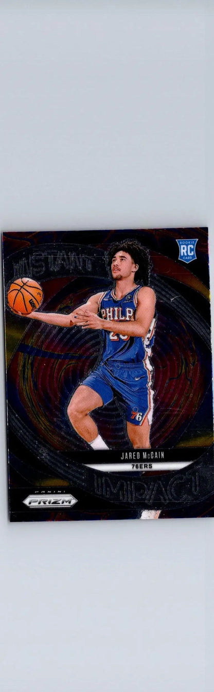 Basketball trading card featuring Jared McCain in blue jersey with basketball, 2024-25 Panini Prizm
