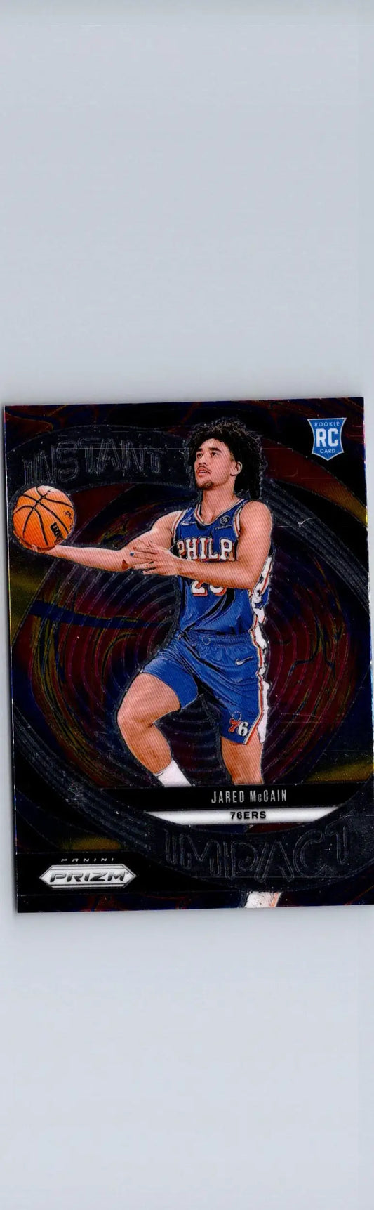 Basketball trading card featuring Jared McCain in blue jersey with basketball, 2024-25 Panini Prizm