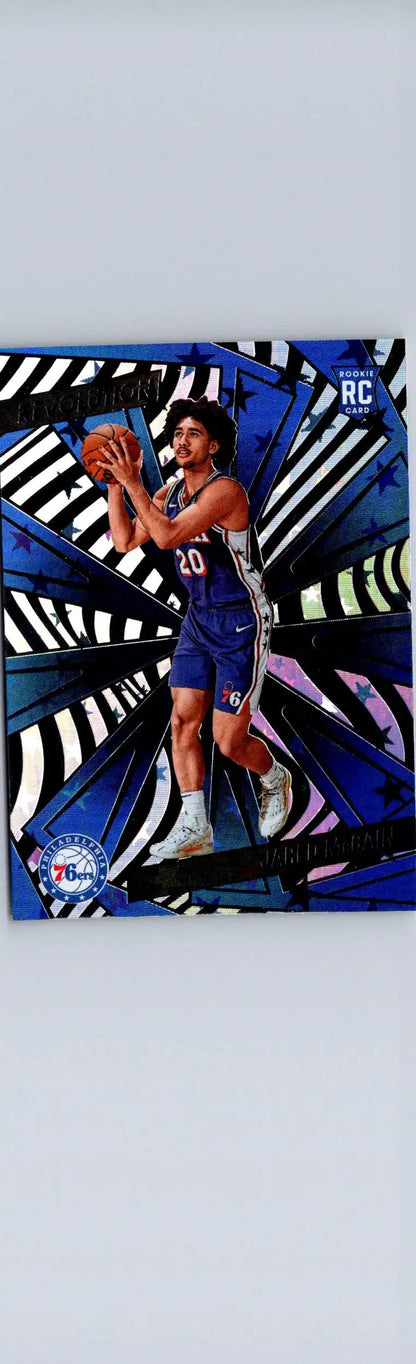 Basketball trading card of Jared McCain in blue uniform from Panini Revolution 2024-25 Fractal