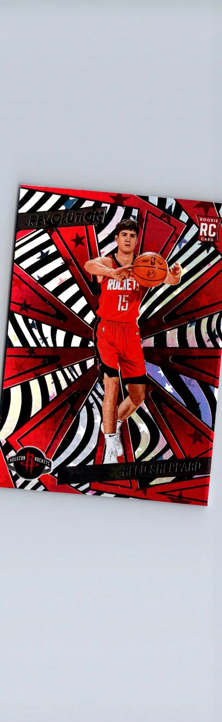 Red and black patterned Reed Sheppard Panini Revolution basketball trading card