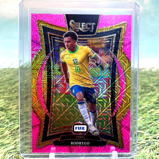 Pink Mojo soccer trading card of Rodrygo in yellow and blue uniform from Panini Select FIFA 2024-25