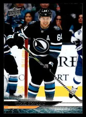 Hockey player Mikael Granlund with stick in Upper Deck San Jose Sharks jersey