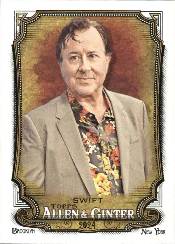 Jeremy Swift NM-MT baseball card displaying a man in a tan suit jacket and floral shirt
