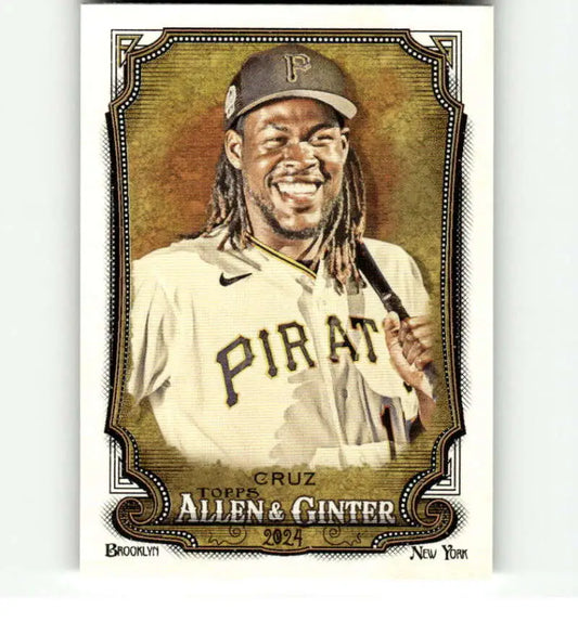 Baseball card of Oneil Cruz in a white jersey for the Pittsburgh Pirates with a smile