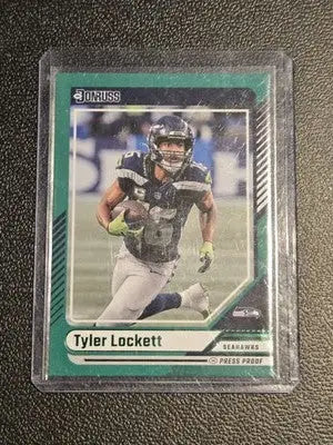 Tyler Lockett football card from 2024 Donruss Press Proof Green series