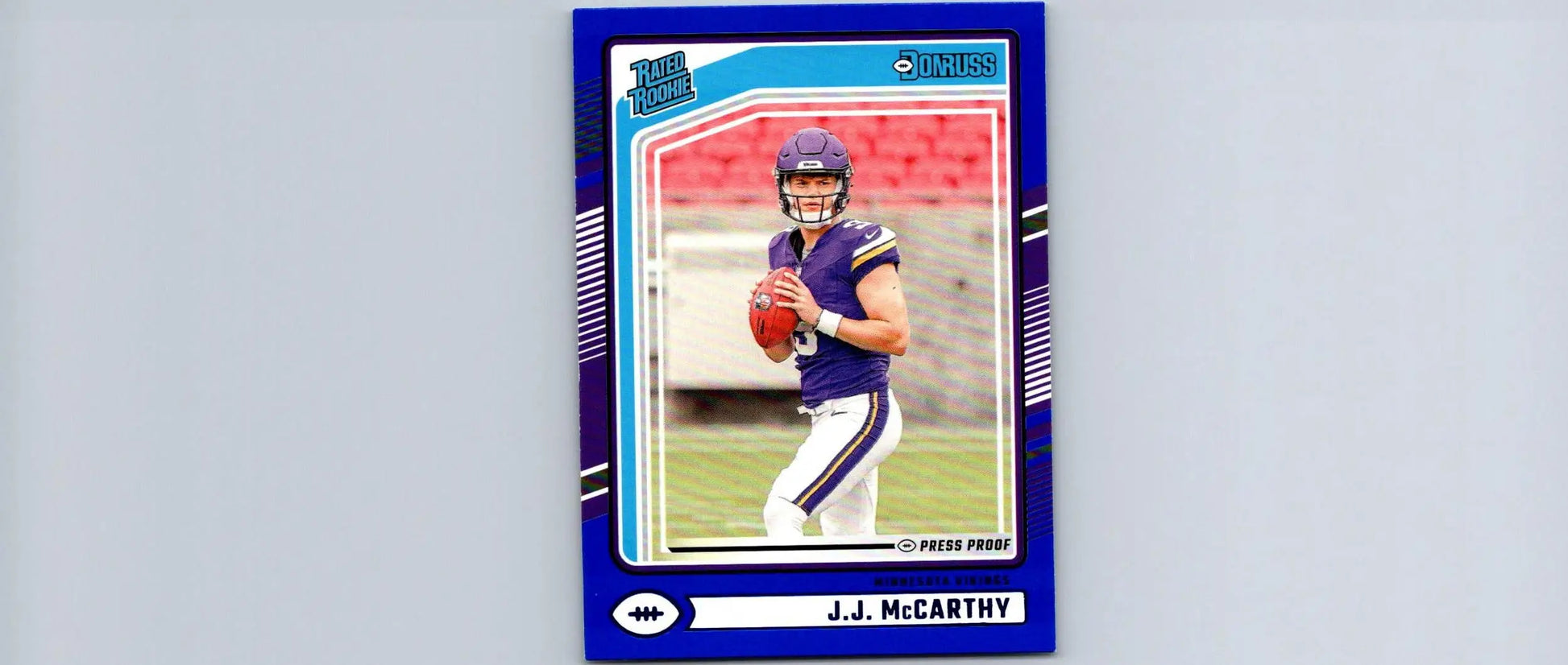 Football trading card featuring J.J. McCarthy in Vikings uniform, 2024 Donruss press proof blue