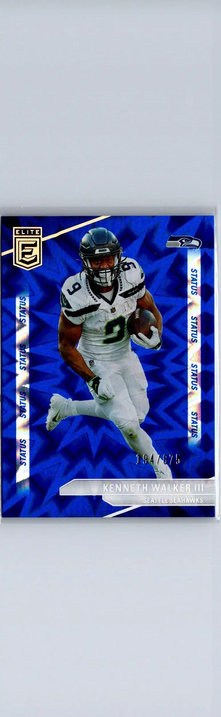 Blue football trading card of Kenneth Walker III in white uniform from 2024 Donruss Elite
