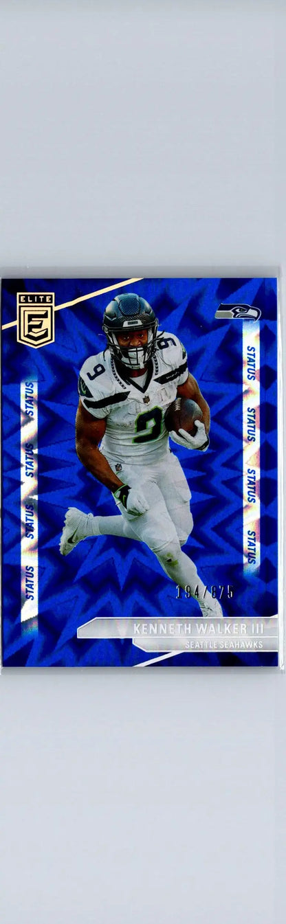 Blue football trading card of Kenneth Walker III in white uniform from 2024 Donruss Elite