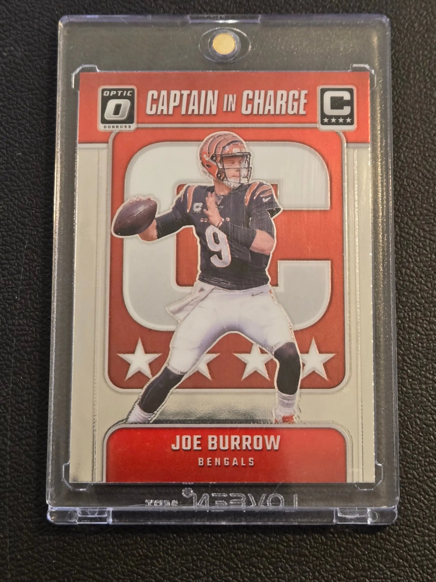 Joe Burrow Captain football trading card in protective case from 2024 Donruss Optic