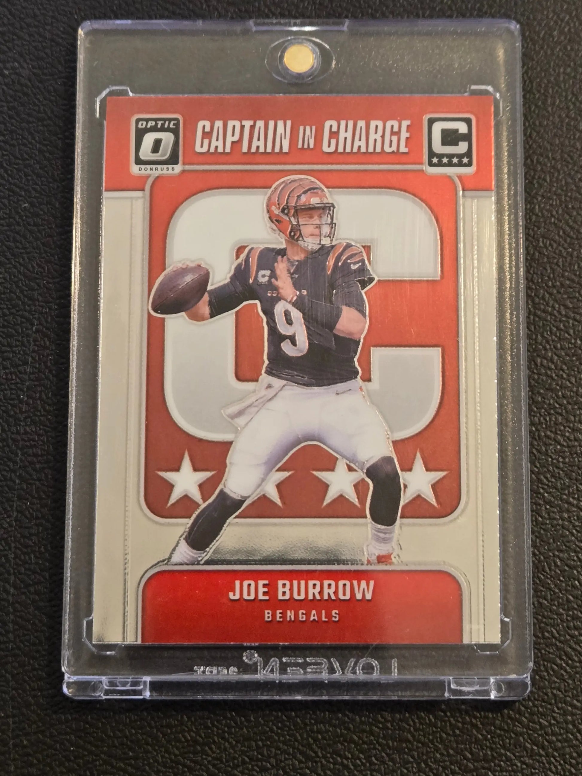 Joe Burrow Captain football trading card in protective case from 2024 Donruss Optic