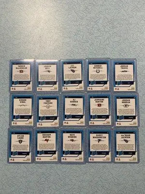 Collection of 18 Donruss Optic Red Pandora NFL Rated Rookie Cards in protective sleeves