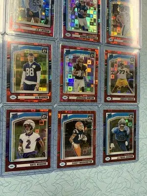 Football trading cards featuring player images and stats from 2024 Donruss Optic Red Pandora series