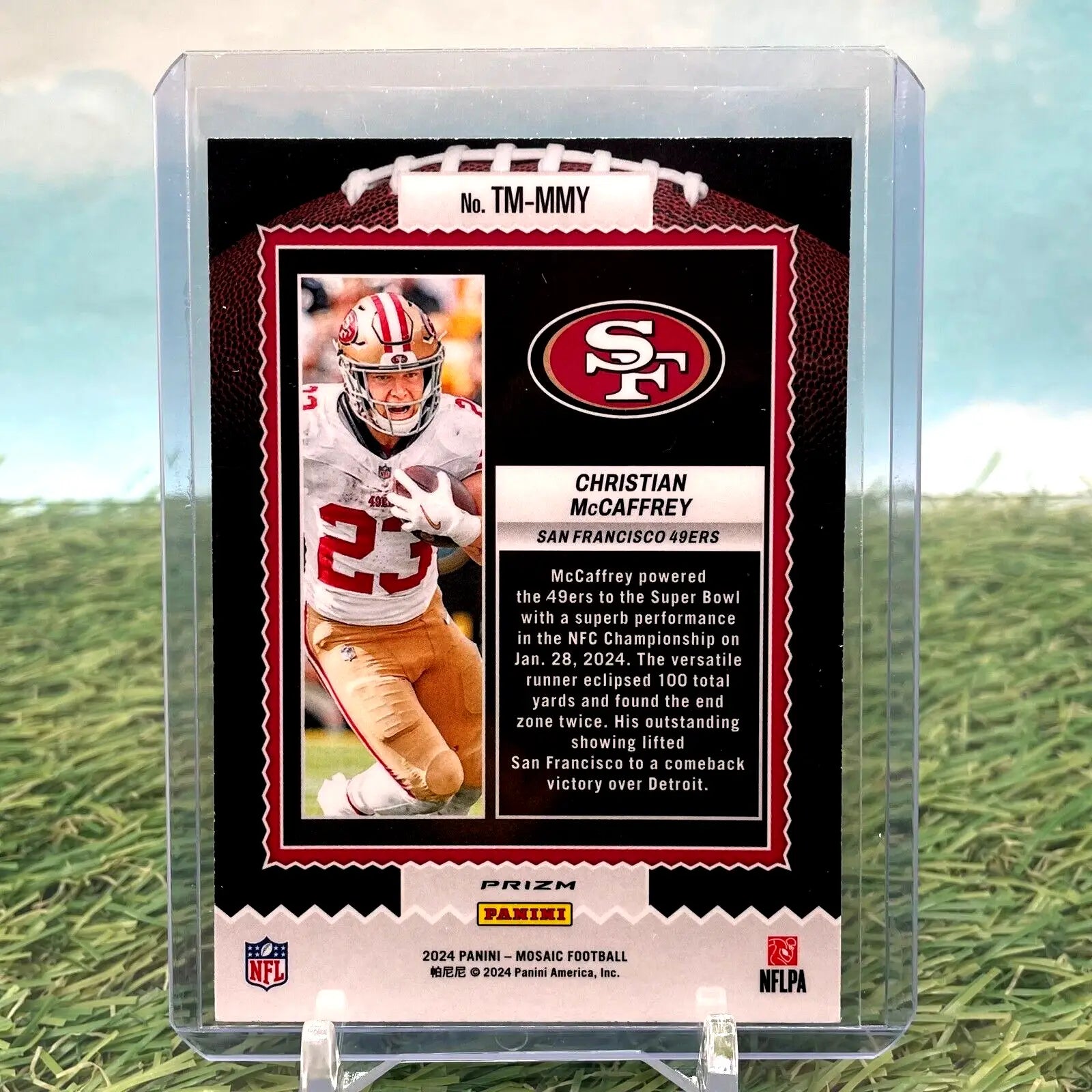 NFL trading card of Christian McCaffrey in red and gold uniform, Mosaic Prizm insert