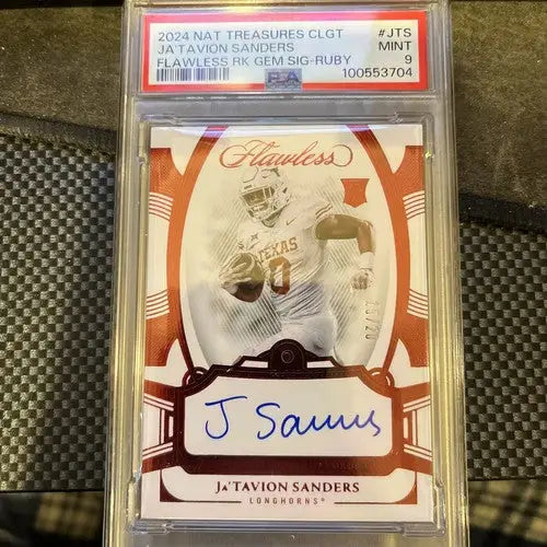 A graded 2024 Flawless Rookie Gem Signature Ruby Ja’Tavion Sanders football card in national treasures collegiate sports trading collection