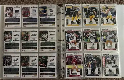 Binder full of Panini Contenders Football trading cards from the complete set