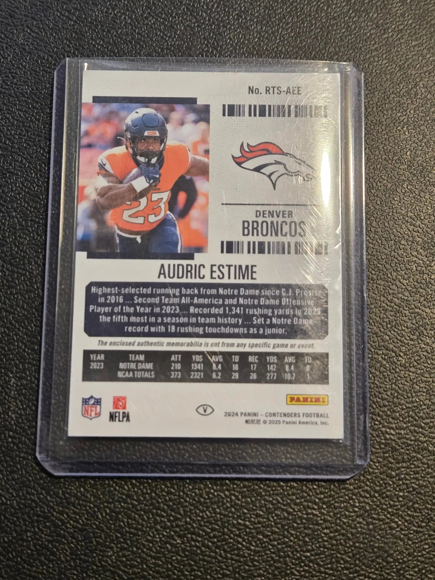 Football trading card in protective sleeve featuring Audric Estime Rookie Ticket Swatches