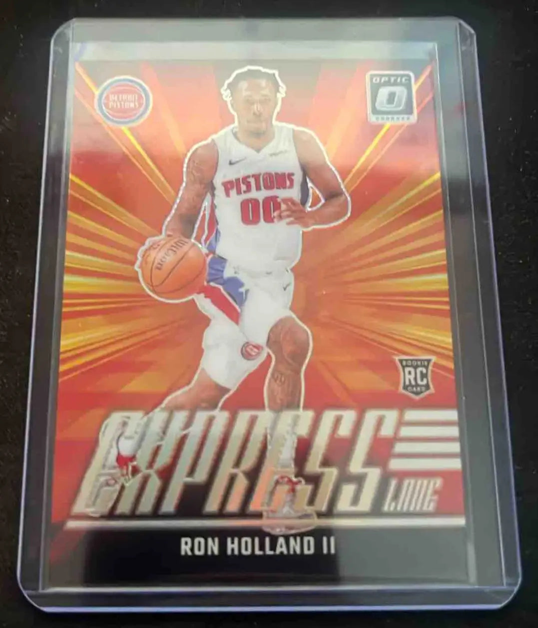 Basketball trading card featuring Ron Holland II in Detroit Pistons uniform from Panini Donruss Optic