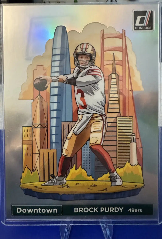 Brock Purdy football card from 2024 Panini Donruss Oversized Downtown collection