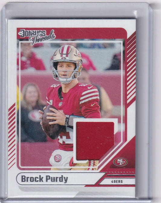 2024 Panini Donruss Relic #DTh-BPU Brock Purdy - San Francisco 49ers - Trading Cards