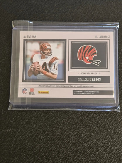 Football trading card featuring Ken Anderson of the Cincinnati Bengals from 2024 Panini Luminance Ken Anderson Vintage Materials Gold