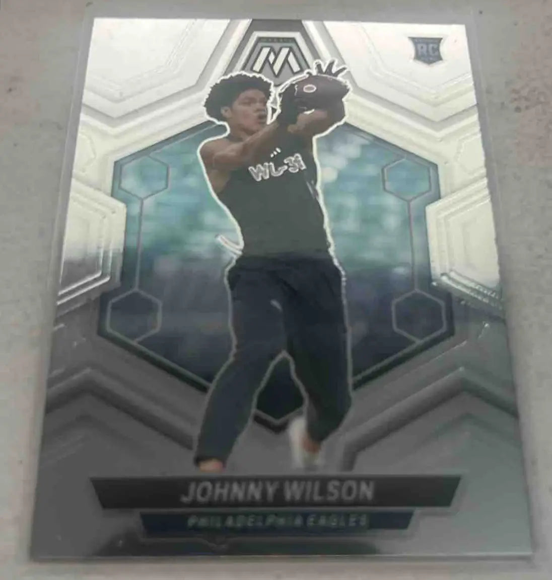 Panini Mosaic Johnny Wilson Silver Prizm football trading card featuring Johnny Wilson Eagles