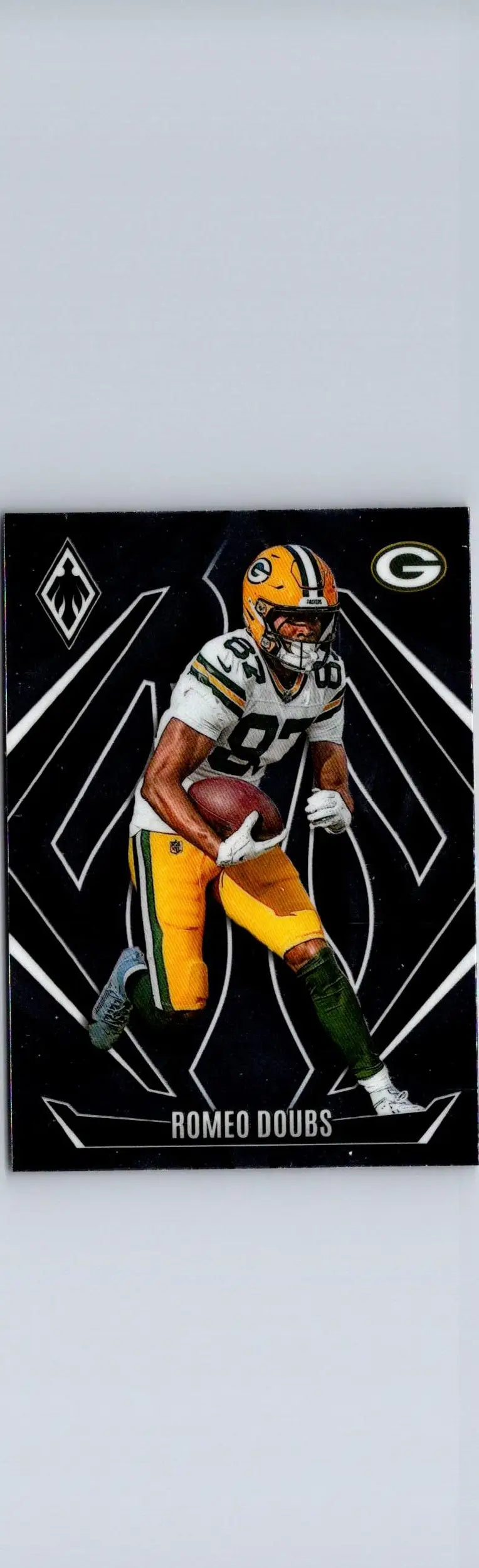 Romeo Doubs football card from 2024 Panini Phoenix series featuring athlete image