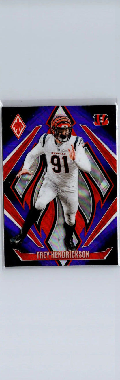 2024 Panini Phoenix Trey Hendrickson football card with purple fade design