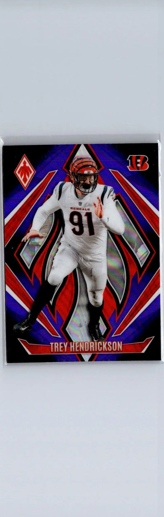 2024 Panini Phoenix Trey Hendrickson football card with purple fade design