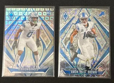 Glossy sports trading cards featuring Terrion Arnold Pandora and Amon-Ra Laser Parallels