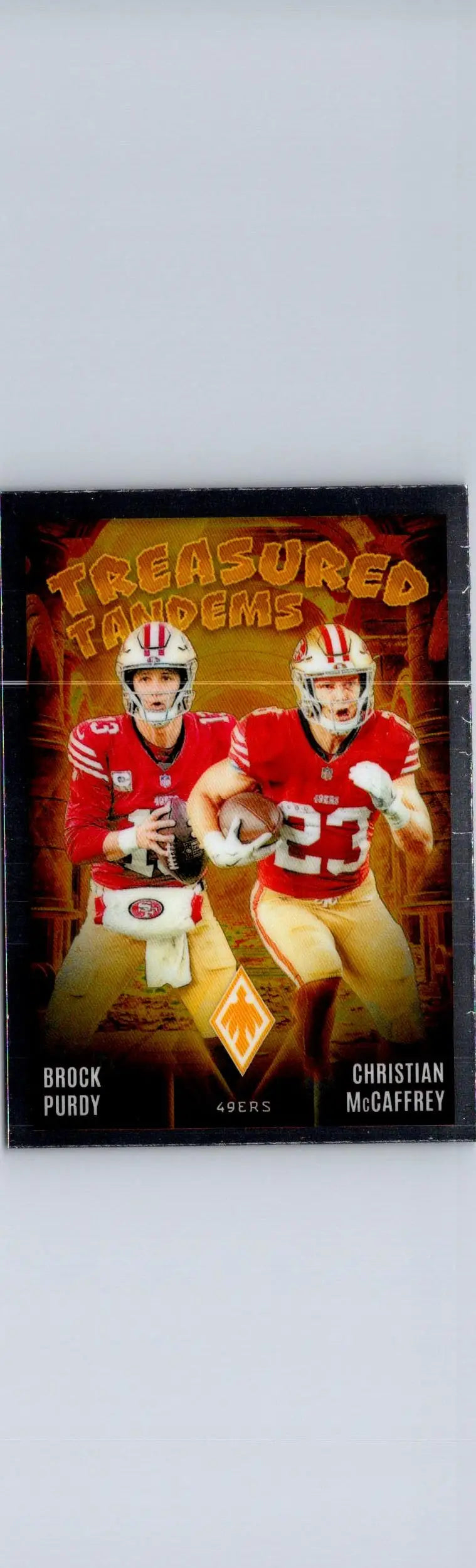 Football card featuring Brock Purdy and Christian McCaffrey Treasured Tandems