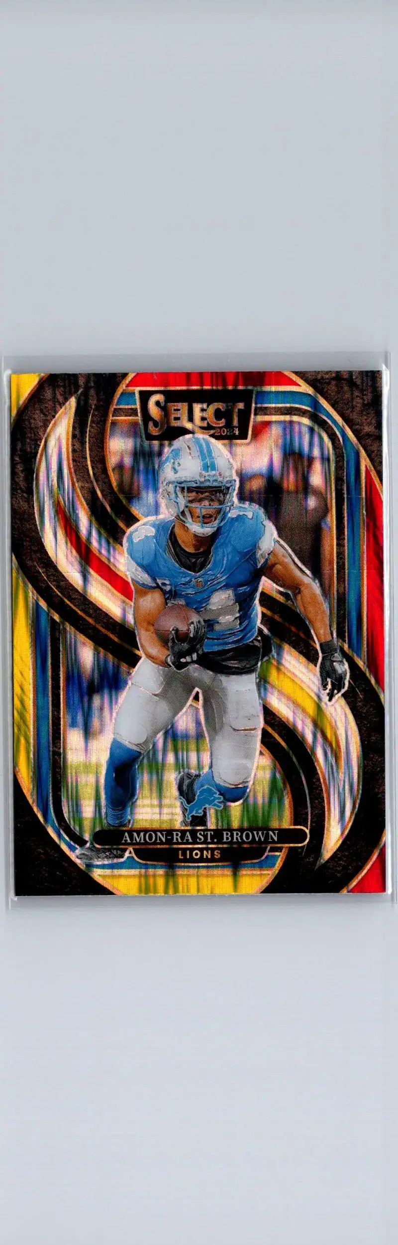 Amon-Ra St. Brown football trading card with yellow prizm shock from Panini Select series