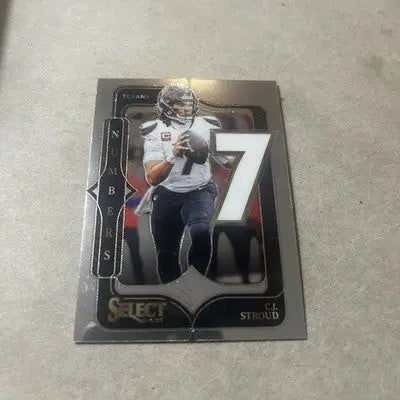 Collectible Panini Select C.J. Stroud trading card featuring Houston Texans player with number 7