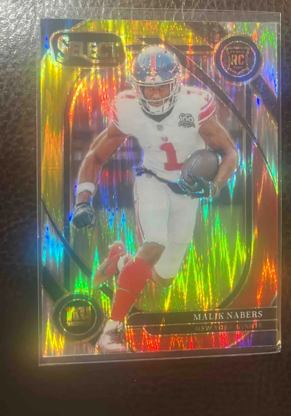 Holographic football trading card featuring Malik Nabers from 2024 Panini Select Malik Nabers Club