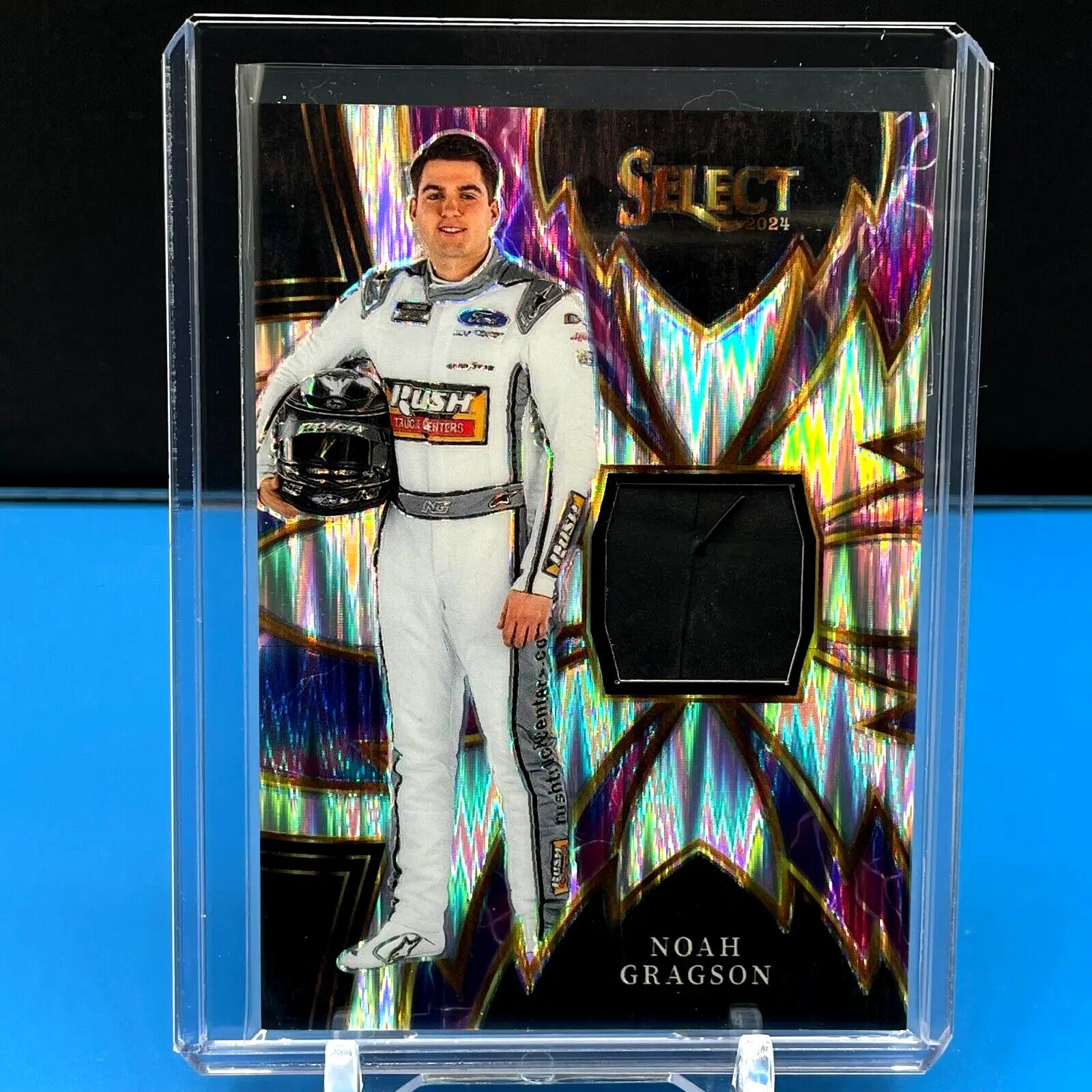 Racing trading card of Noah Gragson in white firesuit from Panini Select Racing