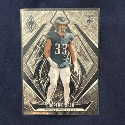 Cooper DeJean Philadelphia Eagles 2024 Phoenix Lasers RC trading card displayed
