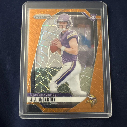 J.J. McCarthy Vikings rookie card in protective case with orange laser finish